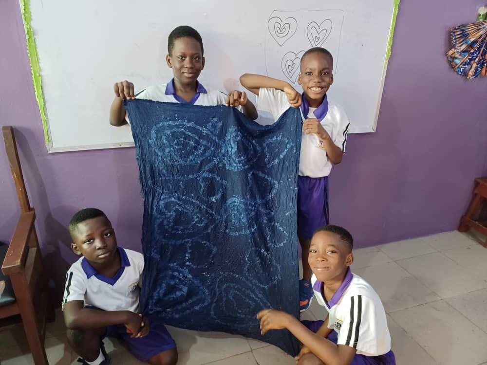 Pupils presenting a creative project