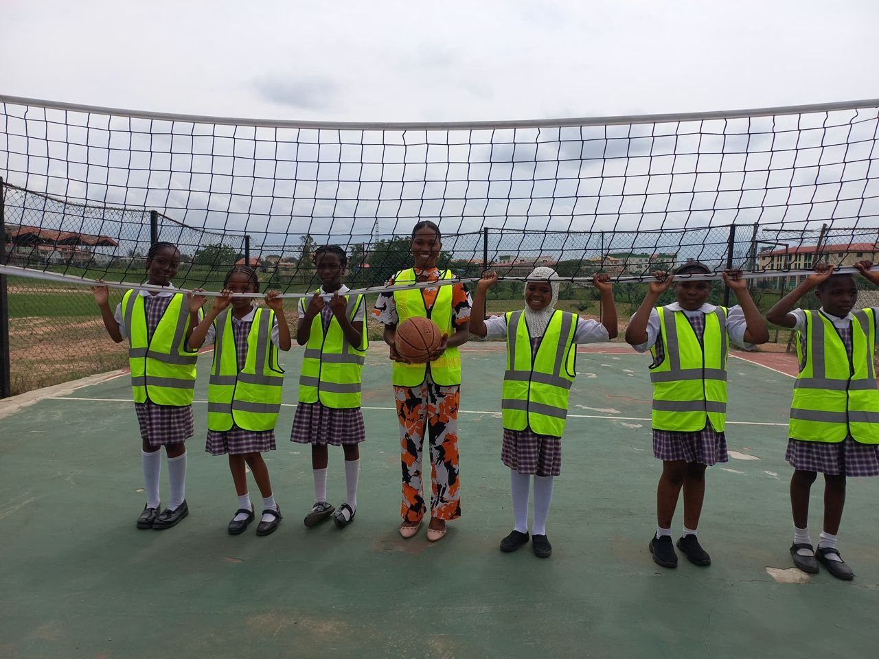 Pupils in high-visibility vests outdoors
